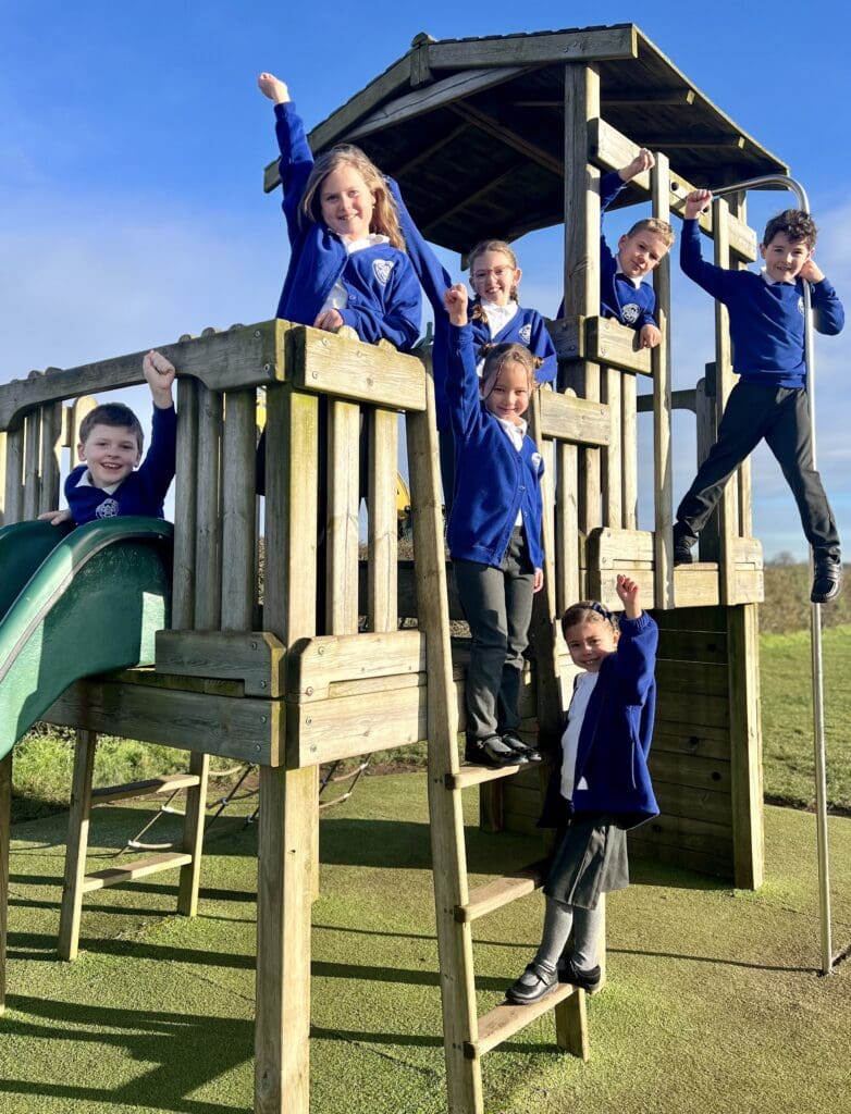 Crudgington Primary School pupils celebrating their Ofsted 'Good' rating