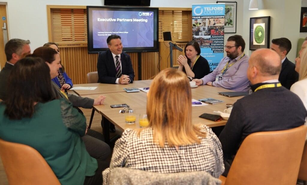 Lawrence Wood chatting to the visitors at the meeting