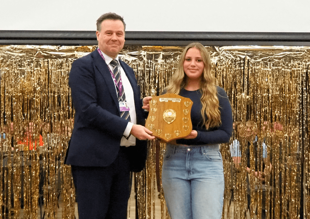1 Belle Phillips receives the work experience student of the year shield from Lawrence Wood of Telford College