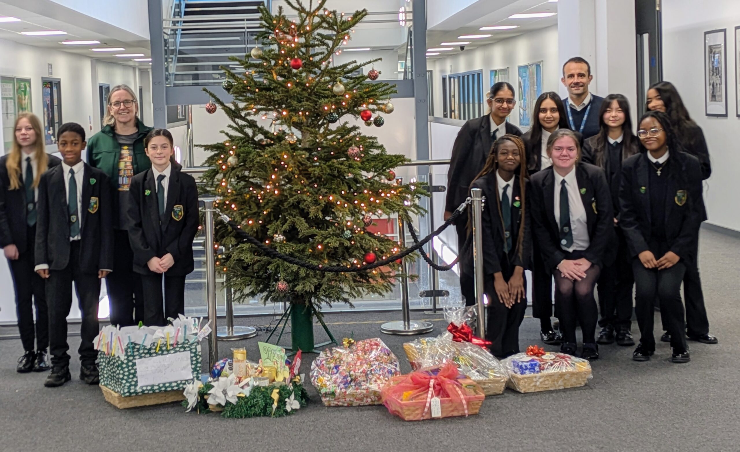 Mrs Bell left Mr Moss Right and Students